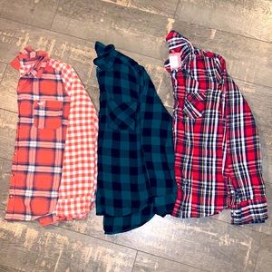 Three ladies plaid button up shirts all fit like small